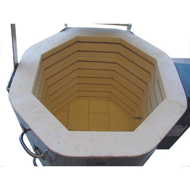 Bird's eye view into the interior firing chamber of an Olympic Kilns MAS1823HE electric kiln, featuring 3" insulating brick and sized at 17.5"W x 22.5"D.