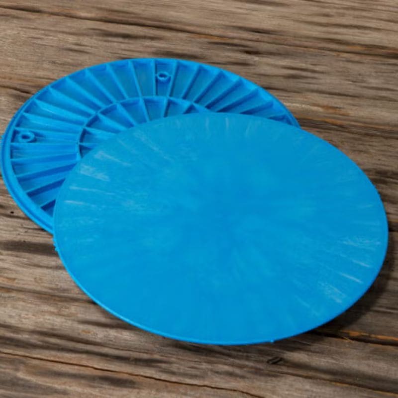 image of 2 12-inch round blue plastic pottery wheel bats from Speedball Art
