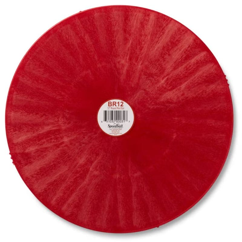 front side of 12-inch round red plastic pottery wheel bat from Speedball Art