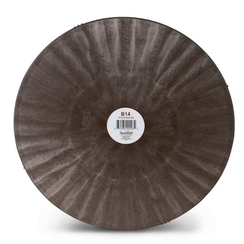 front side of 14-inch round brown plastic pottery wheel bat from Speedball Art