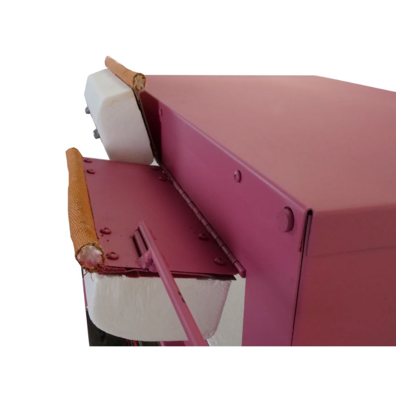 View of top of kiln and opened door, showing interior fiber, on a berry-colored Bluebird glass annealing kiln from Paragon.