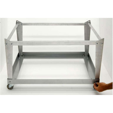 Image of metal stand with wheels with a hand shown tightening the final bolt during assembly