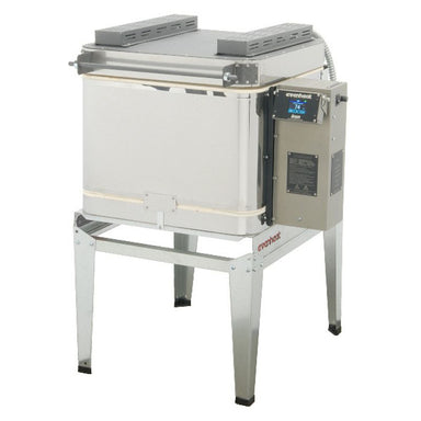 Slightly left-angled front view of closed top-loading GTS 17 glass kiln from Evenheat, with electrical box and temperature controller on right side of kiln, all sitting on a metal stand.