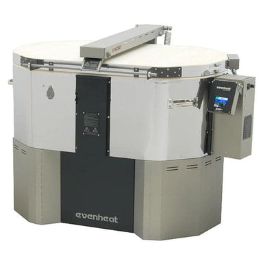 Front-facing left-angled vide of closed Evenheat GTS 2541 Glass Kiln clearly showing various features like lid lift assist, long handle, and Icon+ Digital Controller in Swing View mechanism