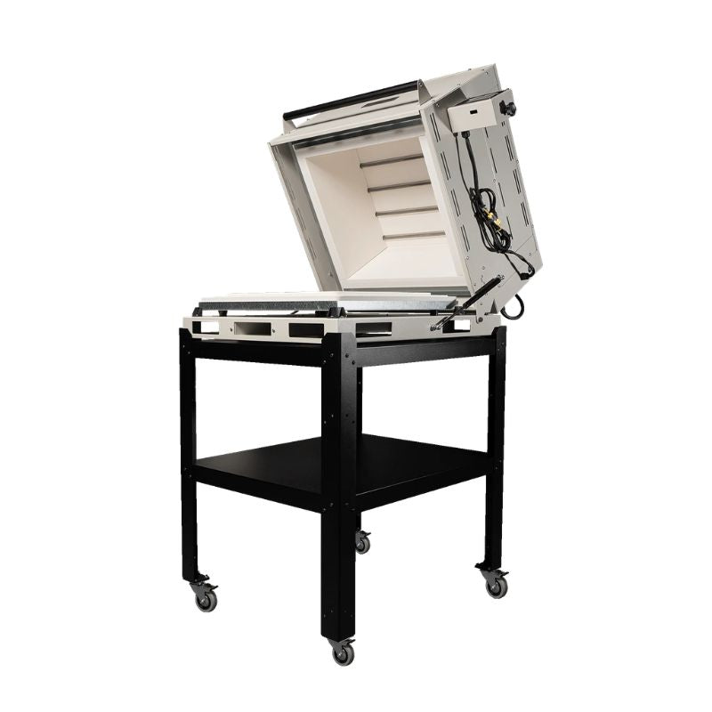 Hero view of opened 18G class oven from Hot Shot Oven & Kiln set atop the included rolling stand, angled to the left.