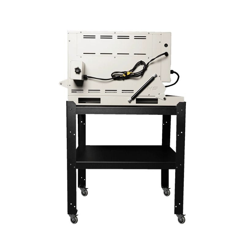 Side view of closed 18G class oven from Hot Shot Oven & Kiln set atop the included rolling stand.