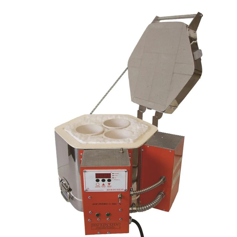 Left-facing opened, round-shaped 3-crucible AF3P Crucible 11 Glass Kiln from Jen-Ken, showing the electrical boxes and the Orton AutoFire AF3C (AF4X) 3-Button controller.