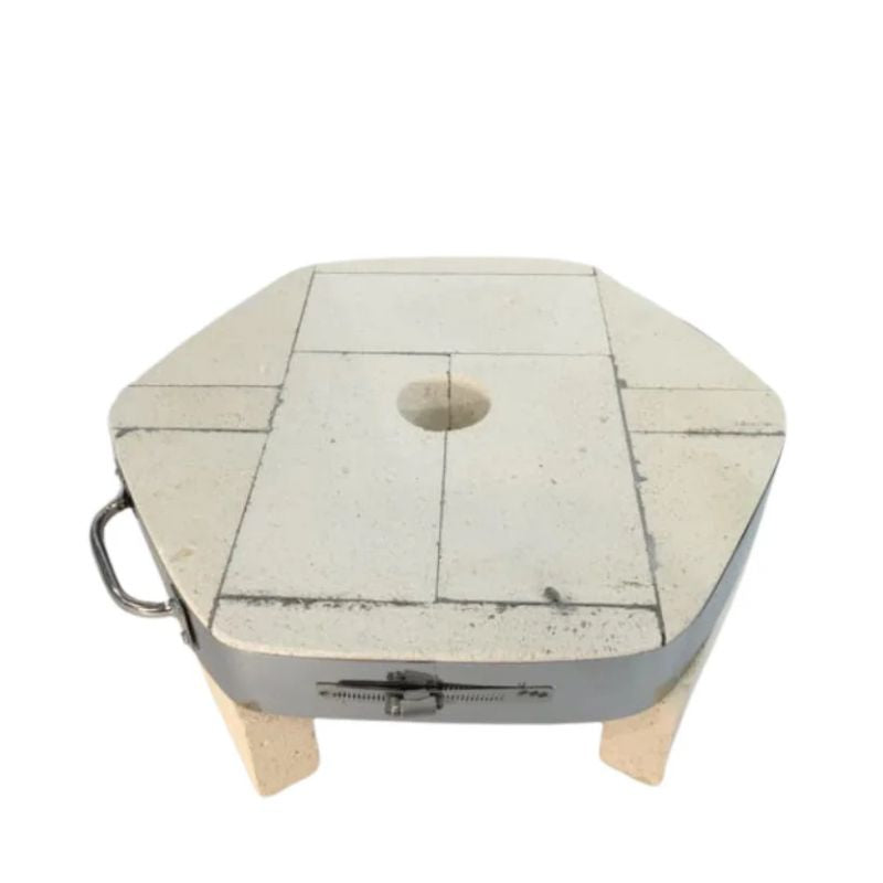 Close up of only the base floor with vitrigraph hole from a Jen-Ken AF3P Vitri Barrel Glass Kiln.