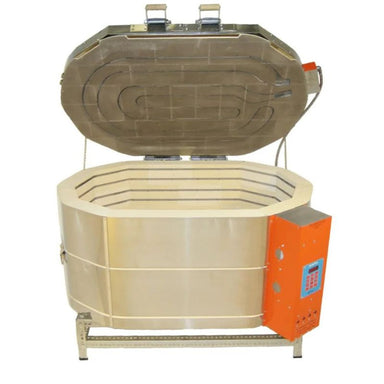 Straight-on view of opened, oval-shaped AF Ceram-A-Glass kiln from Jen-Ken ideal for ceramics, glaze firings, and glass fusing, slumping, and annealing. It's on a short metal stand and showing the electrical box with an Orton AutoFire 4000 12-button controller.