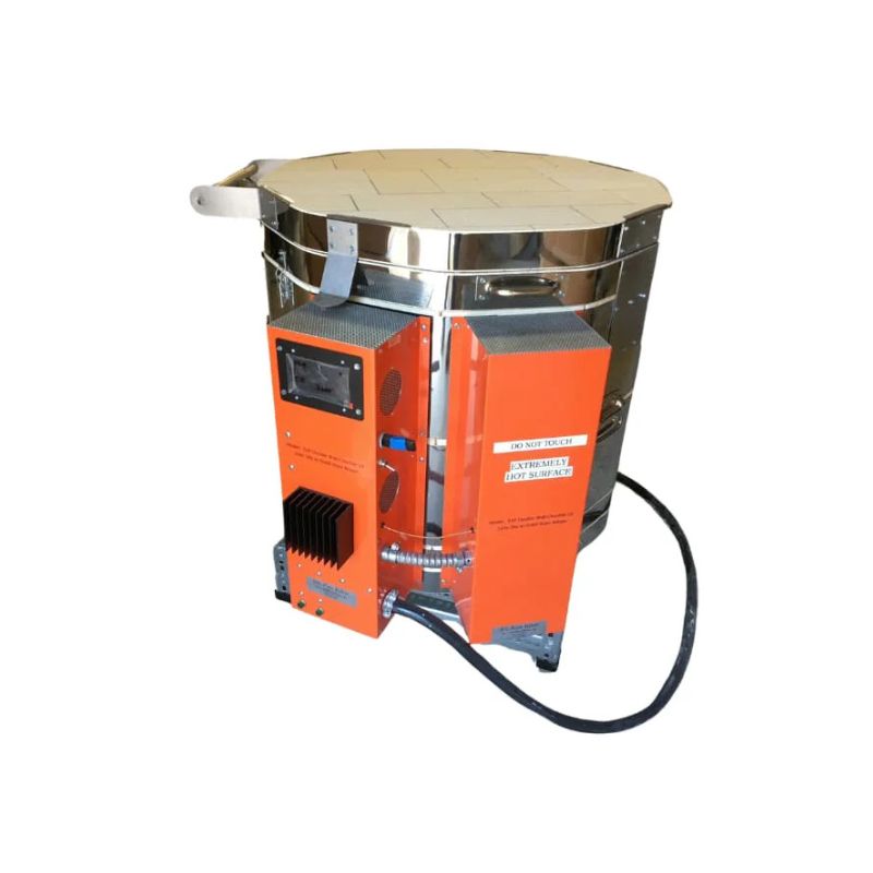 Right-side view of closed, round-shaped AFG double wall  crucible glass kiln from Jen-Ken with electrical boxes visible.