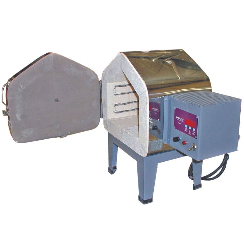 Left-angled front view of front-loading Olympic 129FLE Electric Kiln with opened side-hinged door and Bartlett 3K-CF temperature controller