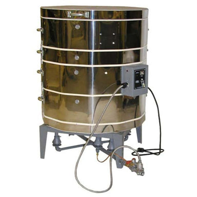 Side view of closed 2831G updraft gas kiln from Olympic placed on top of metal frame with burners.