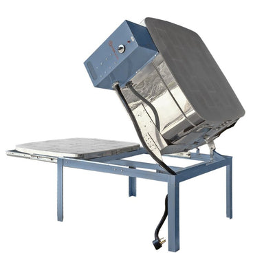 Back-angled view of Clamshell lid opened and sliding floor pulled out on an Olympic Kilns 314 Slider glass firing kiln on a metal stand with electronic box-controller on the right side of kiln.