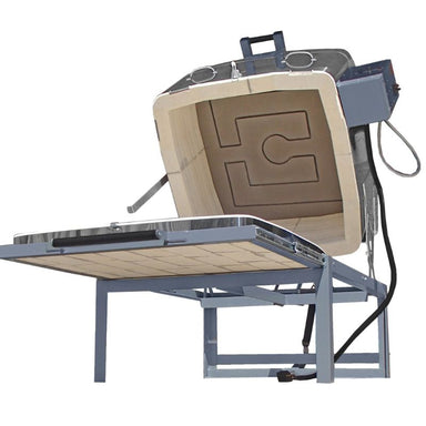 Low front angled view of Olympic Kilns 514 Slider kiln with clamshell lid open and sliding floor pulled out.
