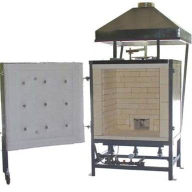 Front view of opened Olympic Kilns large capacity downdraft gas kiln - DD9 model - showing the full 9.2 cubic foot interior brick-constructed firing chamber and the steel vent hood attached to the top.