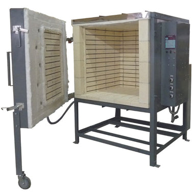 Front view of opened Olympic Kilns FL27E Large Capacity Kiln showing a large amount of 27-cubic-foot interior chamber as well as left-swinging door attached to stand with caster and also electrical box-controller on right side of kiln.