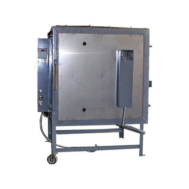 Front view of closed Olympic Kilns FL31E Large Capacity Kiln on metal stand with dedicated breaker box attached to the door and the electrical box-controller on the left side of the kiln.