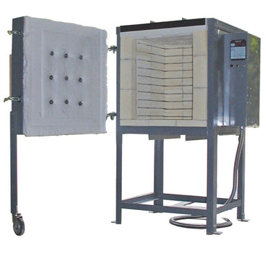Front-angled view of opened left-swing door on large capacity FL5.5E Olympic Kiln on stand with electrical box on right side