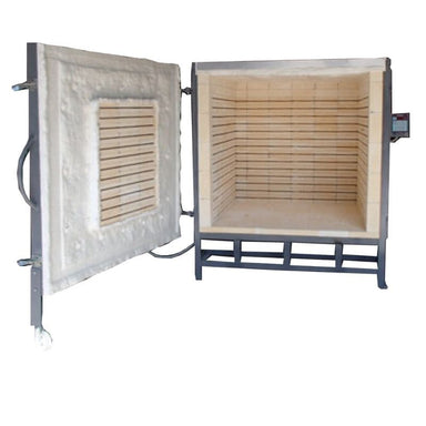 Straight-on front view of opened large capacity Olympic Kilns FL64E electric model on stand with full view of 64-cubic foot interior chamber, door swung open to left, and digital temperature controller on right side of kiln.