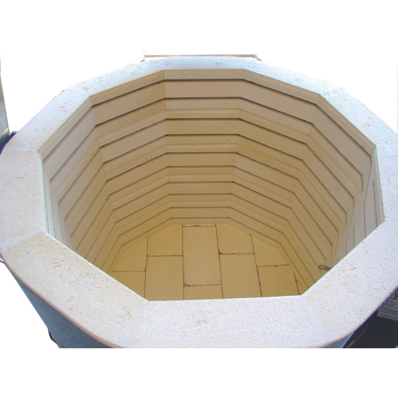 Bird's eye view into the interior firing chamber of an Olympic Kilns MAS2323HE electric kiln, featuring 3" insulating brick and sized at 23-3/8"W x 22.5"D.