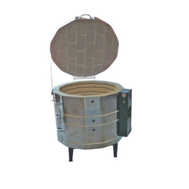 Lid-opened Medallion Artist Series 2823HE Electric Kiln from Olympic with partial view of solid green electronic controller box.