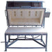 Front view of opened clamshell lid on a large scale Olympic Kilns GF10E glass fusing kiln on stand with casters and electrical box-controller on the right side.