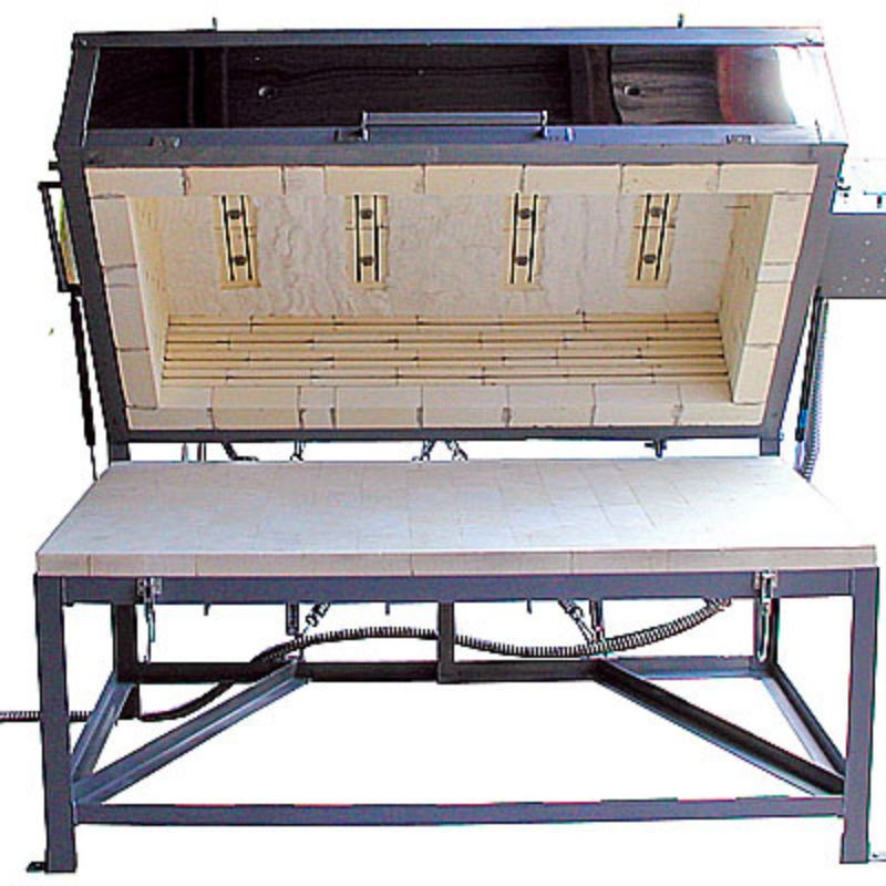 Front view of opened clamshell lid on a large capacity Olympic Kilns GF12E glass fusing kiln on a stand.