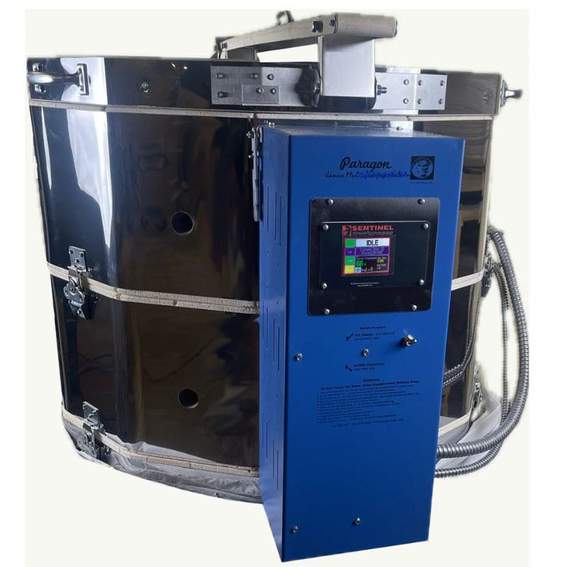 Slightly right-angled view of opened, 12-sided round-shaped CT122822 ceramics and glass kiln from Paragon with the Paragon Blue-colored electrical box with Sentinel TouchExpress digital controller right in front.