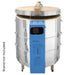 Straight-on view of slightly-opened, 12-sided round-shaped CT122829 Janus ceramics and glass kiln from Paragon with the Paragon Blue-colored electrical box with Sentinel SmartTouch digital controller right in front.