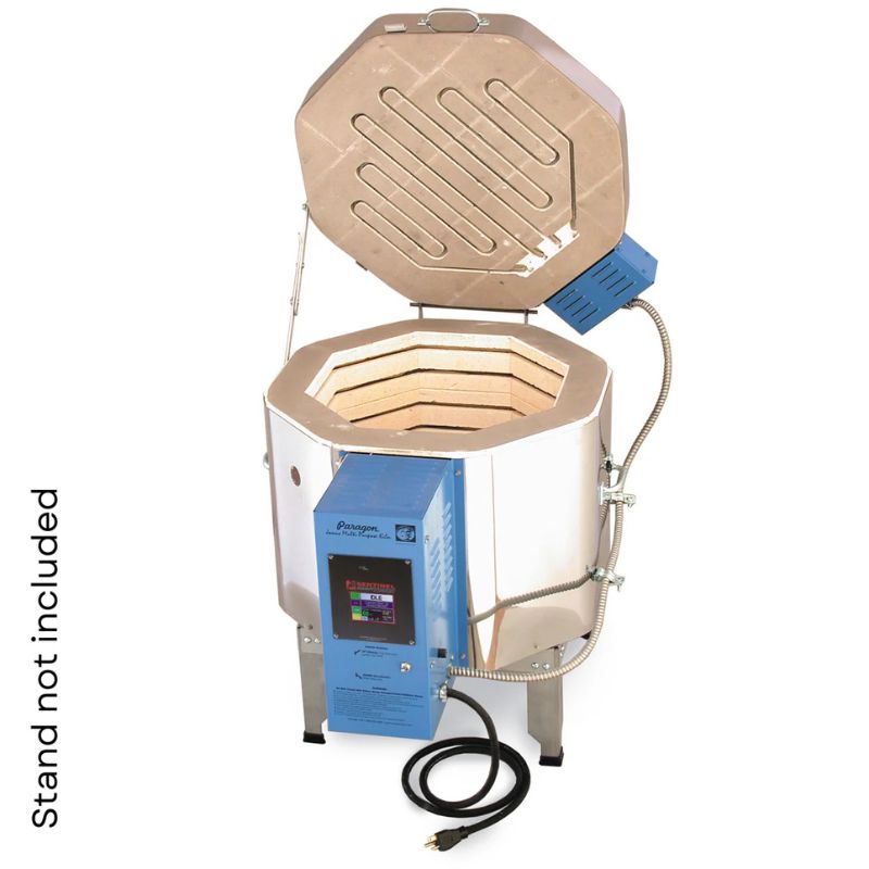 Slightly left-angled view of 8-sided, round-shaped, fully-opened CT81713 Janus Ceramic and Glass kiln from Paragon Kilns, set on a short metal stand with electrical box/power cord/Sentinel SmartTouch digital controller viewable in the front.