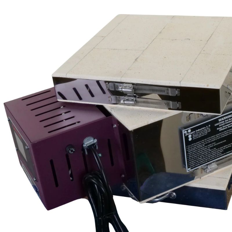 Caldera multi-purpose kiln model from Paragon, with Sentinel TouchXpress controller, showing the lid and floor at different angle than chamber section.