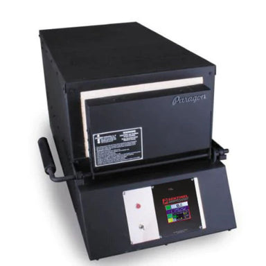 Closed KM9 Double Barrel Knife Making kiln from Paragon Kilns, in black color, with door handle on left and Sentinel TouchXpress controller beneath door.