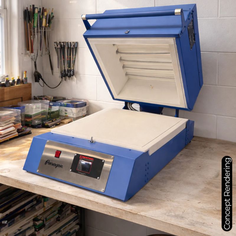 Opened CSF16 glass fusing kiln from Paragon, set on a counter in a workshop.