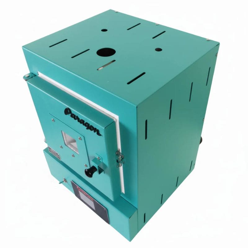 View of closed SC3 PMC/Jewelry Kiln from Paragon in the Turquoise color. Can see top, right side, and front of the kiln, as well as the Sentinel TouchXpress digital controller.