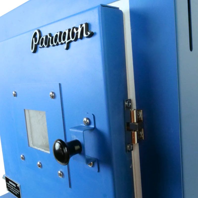 Close up view of door knob and latch on closed SC3 PMC/Jewelry Kiln from Paragon. (Paragon Blue color)
