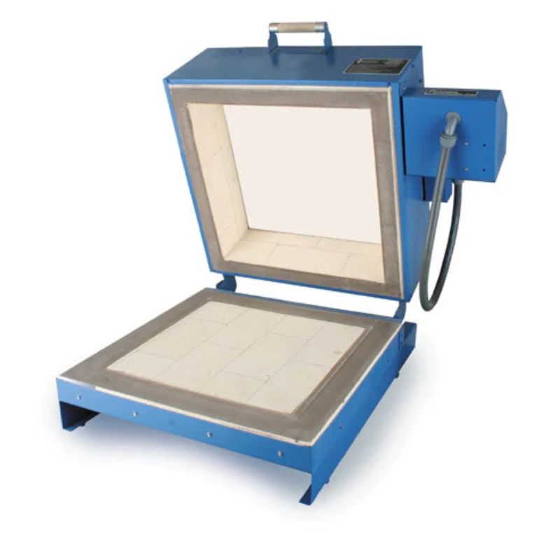 Clamshell lid opened on a Paragon Kilns CS19S glass fusing kiln against a plain white background.