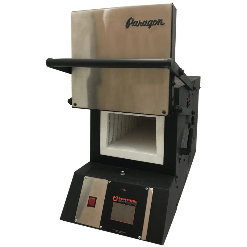 Opened KM9 Pro Knife Making kiln from Paragon Kilns, in black color, with Sentinel TouchXpress controller beneath door.