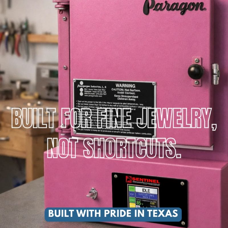 View of closed SC2 PMC/Jewelry Kiln from Paragon in a workshop. Hot Pink color. Also shown is the Sentinel TouchXpress digital controller. Text reads Built for fine jewelry, not shortcuts. Built with pride in Texas.