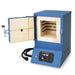 Slighly left-angled, opened Q11 dual-media, multipurpose kiln from Paragon, colored in Paragon Blue showing the interior chamber and it's side-wall heating elements. Controller at bottom of kiln below left-side hinged front-loading door.