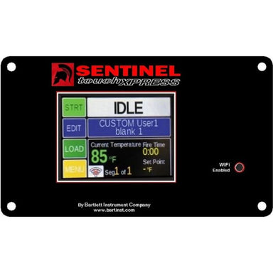 Sentinel TouchXpress kiln controller with color touchscreen display showing idle screen, temperature readout, program options, and WiFi indicator.