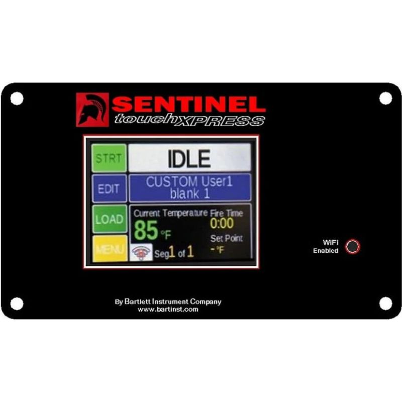 Sentinel TouchXpress kiln controller with color touchscreen display showing idle screen, temperature readout, program options, and WiFi indicator.