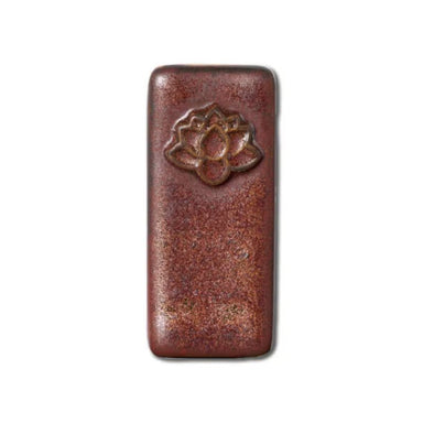 blackened copper mid-fire glaze sample tile from Speedball Art