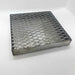 Gray  tray with grating made for wax drippings in kiln. 7" x 7" x 1".