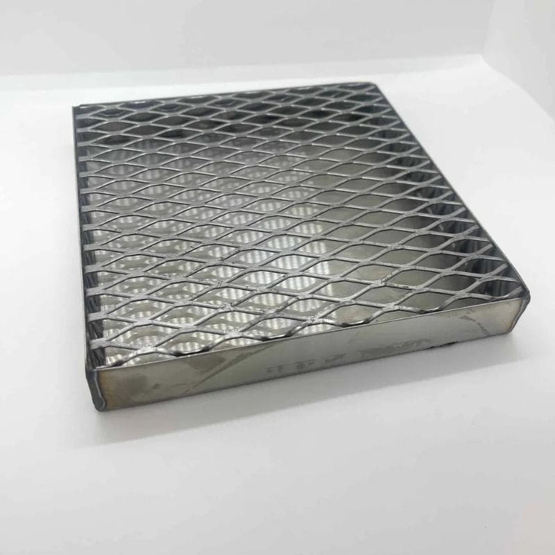 Gray  tray with grating made for wax drippings in kiln. 7" x 7" x 1".