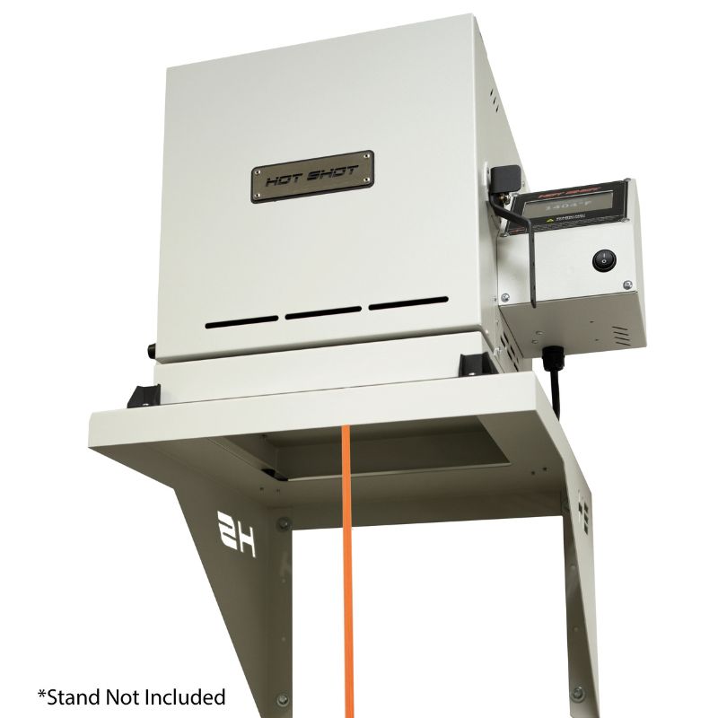 Hot Shot HS-7GVkiln on stand with side-mounted controller; the orange line shown is a safety strap, not a power cord or molten glass.