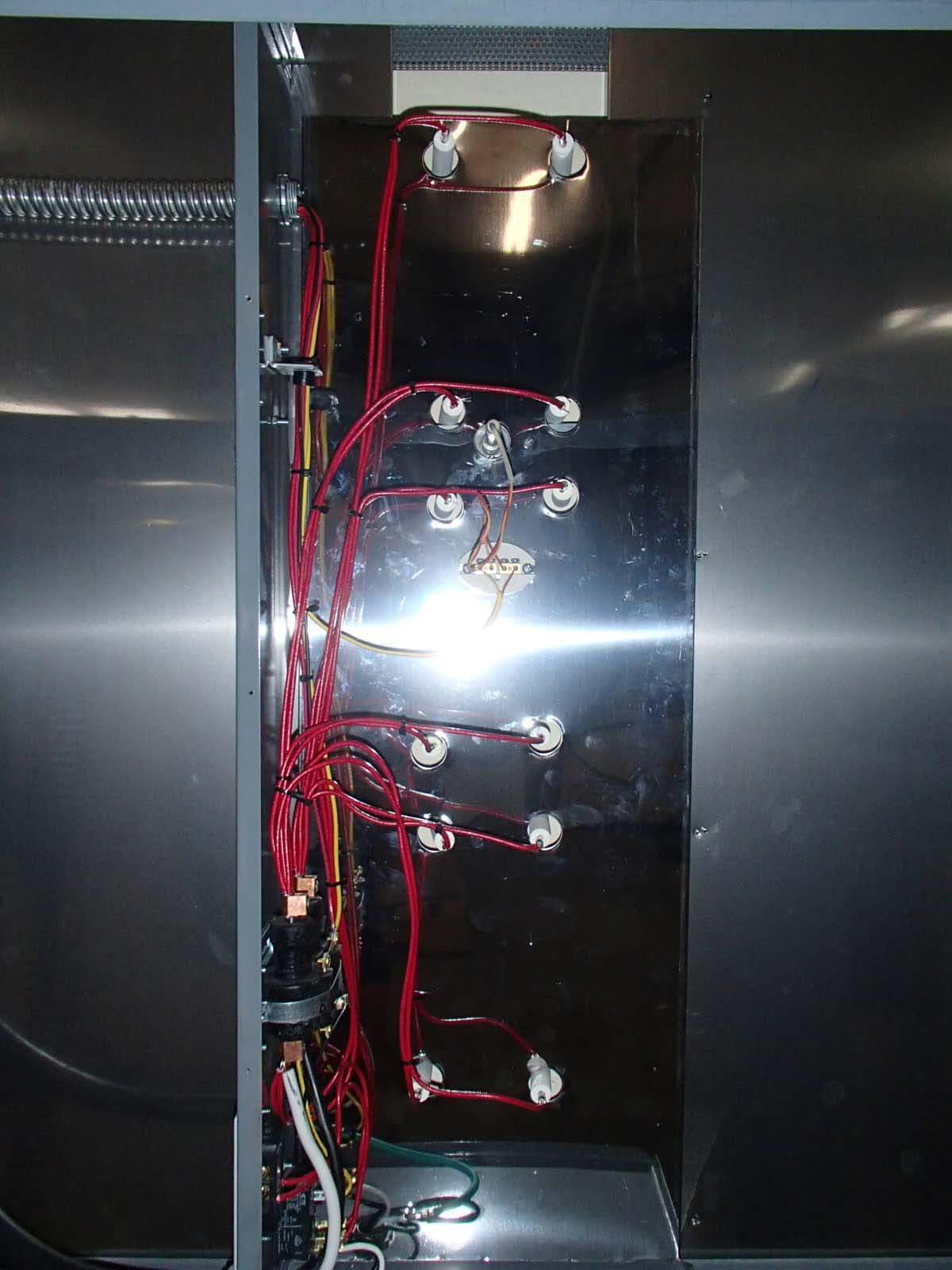 Interior view of the electrical box from an Olympic Kilns DPF24E Large Capacity Kiln.